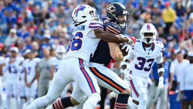 Chicago Bears tight end Tommy Sweeney (47) is tackled by Buffalo Bills safety Kendall Williamson