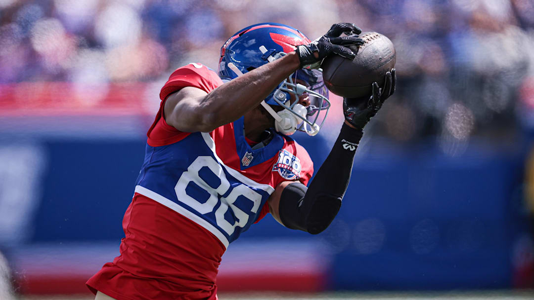 Sep 8, 2024; East Rutherford, New Jersey, USA; New York Giants wide receiver Darius Slayton (86) catches the ball during the first half against the Minnesota Vikings at MetLife Stadium. Mandatory Credit: Vincent Carchietta-Imagn Images