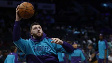 Apr 6, 2025; Charlotte, North Carolina, USA; Charlotte Hornets center Jusuf Nurkic (11) shoots before a game against the Chicago Bulls at Spectrum Center. Mandatory Credit: Nell Redmond-Imagn Images