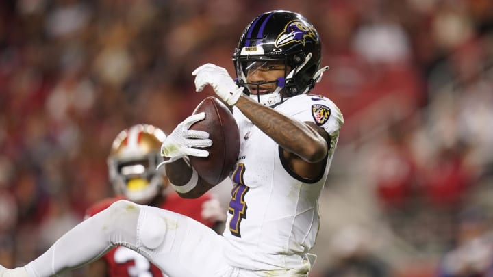 Dec 25, 2023; Santa Clara, California, USA; Baltimore Ravens wide receiver Zay Flowers (4) makes a catch for a touchdown against the San Francisco 49ers in the third quarter at Levi's Stadium. Mandatory Credit: Cary Edmondson-USA TODAY Sports