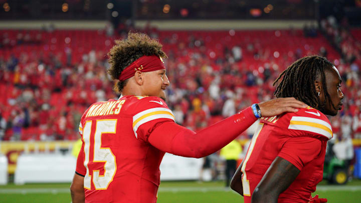 Sep 5, 2024; Kansas City, Missouri, USA; Kansas City Chiefs quarterback Patrick Mahomes (15) celebrates with wide receiver Xavier Worthy (1) after the win over the Baltimore Ravens at GEHA Field at Arrowhead Stadium. Mandatory Credit: Denny Medley-Imagn Images