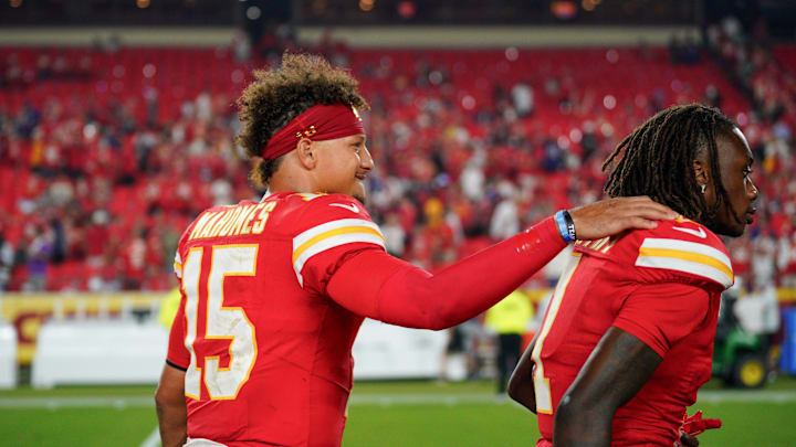 Sep 5, 2024; Kansas City, Missouri, USA; Kansas City Chiefs quarterback Patrick Mahomes (15) celebrates with wide receiver Xavier Worthy (1) after the win over the Baltimore Ravens at GEHA Field at Arrowhead Stadium. Mandatory Credit: Denny Medley-Imagn Images