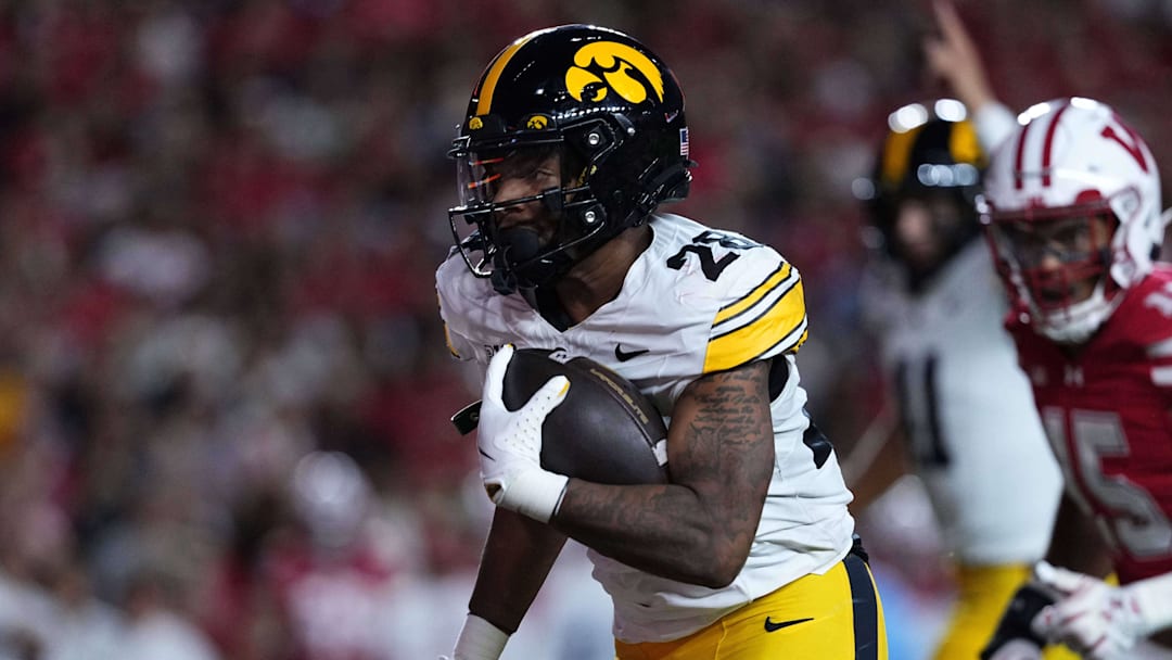 Oct 11, 2025; Madison, Wisconsin, USA; Iowa Hawkeyes running back Kamari Moulton (28) runs the ball in the second quarter against the Wisconsin Badgers at Camp Randall Stadium. Mandatory Credit: Ross Harried-Imagn Images