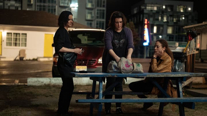 Juliette Lewis as Natalie, Melanie Lynskey as Shauna, and Tawny Cypress as Taissa in Yellowjackets season 1