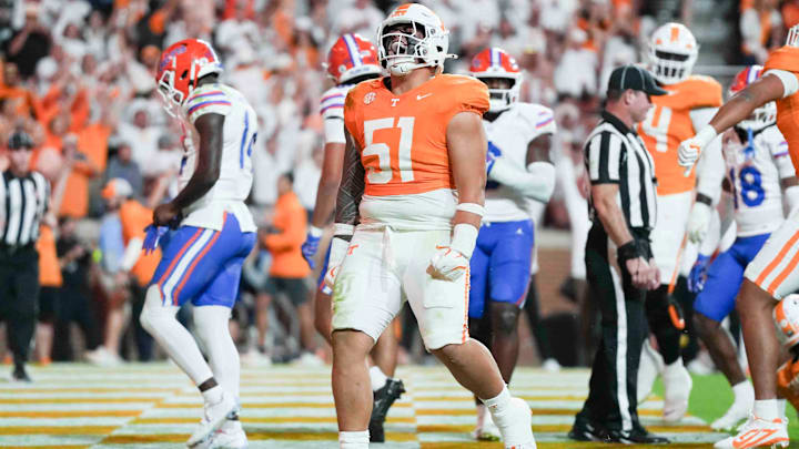 Tennessee defensive lineman Jaxson Moi (51) celebrates after a touchdown by Tennessee running back Dylan Sampson (6) during a game between Florida and Tennessee in Neyland Stadium, in Knoxville, Tenn., Saturday, Oct. 12, 2024. Tennessee defensive lineman Jaxson Moi (51) celebrates after a touchdown by Tennessee running back Dylan Sampson (6) during a game between Florida and Tennessee in Neyland Stadium, in Knoxville, Tenn., Saturday, Oct. 12, 2024.
