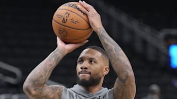 Nov 2, 2024; Milwaukee, Wisconsin, USA; Milwaukee Bucks guard Damian Lillard (0) warms up before a game against Cleveland Cavaliers at Fiserv Forum. Mandatory Credit: Michael McLoone-Imagn Images