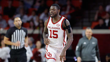 Feb 22, 2025; Norman, Oklahoma, USA; Oklahoma Sooners guard Duke Miles (15) runs down the court on a play against the Mississippi State Bulldogs during the second half at Lloyd Noble Center.