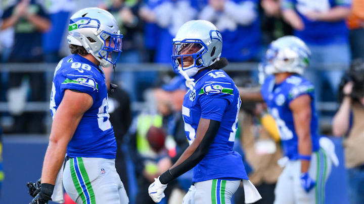 Oct 5, 2025; Seattle, Washington, USA; Seattle Seahawks wide receiver Tory Horton (15) is congratulated by tight end AJ Barner (88) after catching a touchdown pass against the Tampa Bay Buccaneers during the second half at Lumen Field. Mandatory Credit: Steven Bisig-Imagn Images Oct 5, 2025; Seattle, Washington, USA; Seattle Seahawks wide receiver Tory Horton (15) is congratulated by tight end AJ Barner (88) after catching a touchdown pass against the Tampa Bay Buccaneers during the second half at Lumen Field. Mandatory Credit: Steven Bisig-Imagn Images