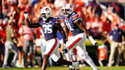 Oct 28, 2023; Auburn, Alabama, USA; Auburn Tigers linebacker Jalen McLeod (35) reacts to his sack of Mississippi State Bulldogs quarterback Mike Wright (14) for a loss during the second quarter at Jordan-Hare Stadium. Mandatory Credit: John David Mercer-Imagn Images