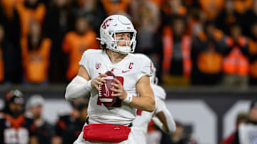 Nov 23, 2024; Corvallis, Oregon, USA; Washington State Cougars quarterback John Mateer (10) sets up to pass during the third quarter against the Oregon State Beavers at Reser Stadium. Mandatory Credit: Craig Strobeck-Imagn Images