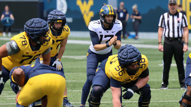 West Virginia University quarterback Jackson Crist awaits the snap during the Gold-Blue Spring Game.