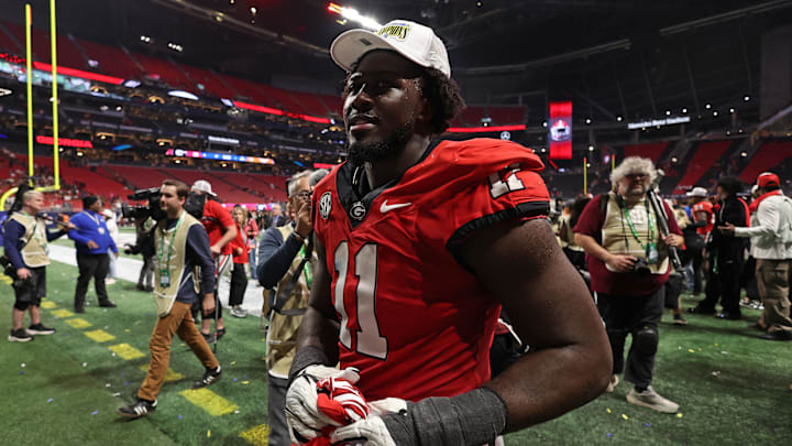 Dec 7, 2024; Atlanta, GA, USA; Georgia Bulldogs linebacker Jalon Walker (11) reacts after defeating the Texas Longhorns in overtime in the 2024 SEC Championship game at Mercedes-Benz Stadium. Mandatory Credit: Brett Davis-Imagn Images