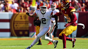 Oct 6, 2024; Landover, Maryland, USA; Cleveland Browns wide receiver Amari Cooper (2) runs the ball against a catch against Washington Commanders cornerback Benjamin St-Juste (25) during the second quarter at NorthWest Stadium. Mandatory Credit: Peter Casey-Imagn Images