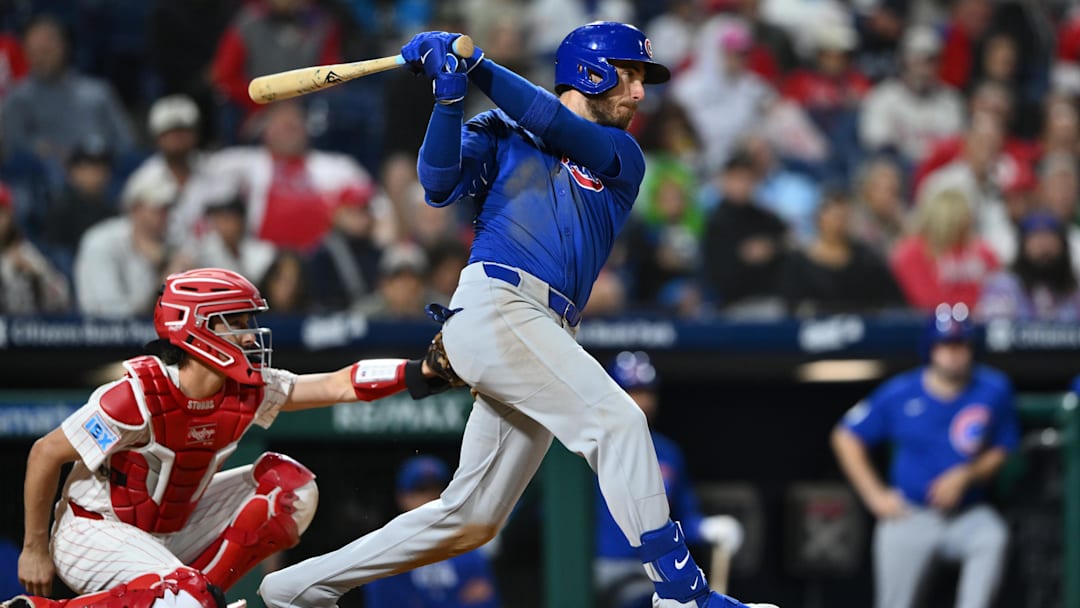 Sep 24, 2024; Philadelphia, Pennsylvania, USA; Chicago Cubs outfielder Cody Bellinger (24) hits a single against the Philadelphia Phillies in the eighth inning at Citizens Bank Park. Mandatory Credit: Kyle Ross-Imagn Images