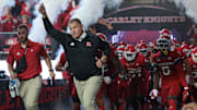 Sep 24, 2022; Piscataway, New Jersey, USA; Rutgers Scarlet Knights head coach Greg Schiano leads the Scarlet Knights football team onto the field before a game against the Iowa Hawkeyes at SHI Stadium. Mandatory Credit: Vincent Carchietta-Imagn Images