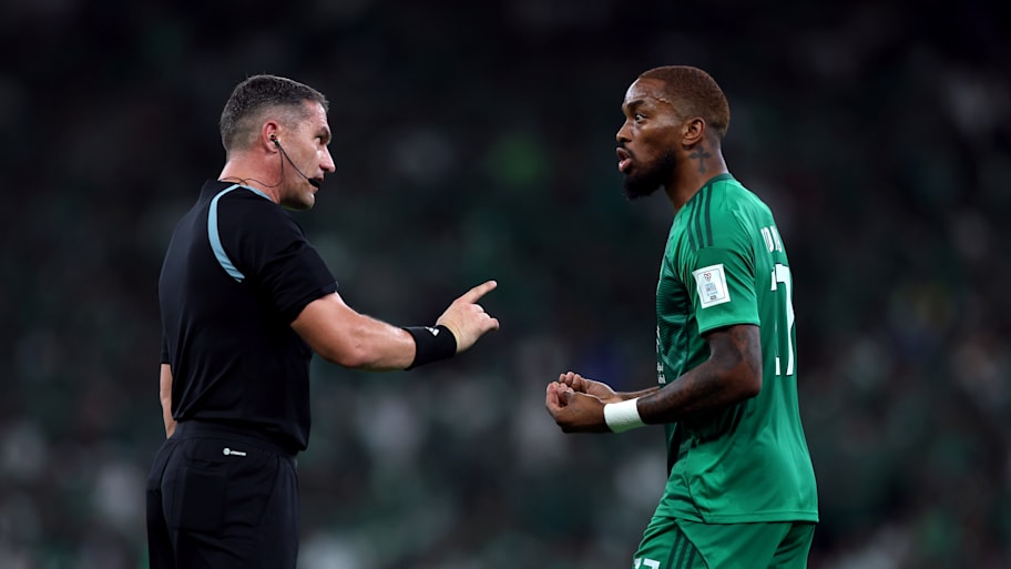 Ivan Toney (right) talking to a referee.