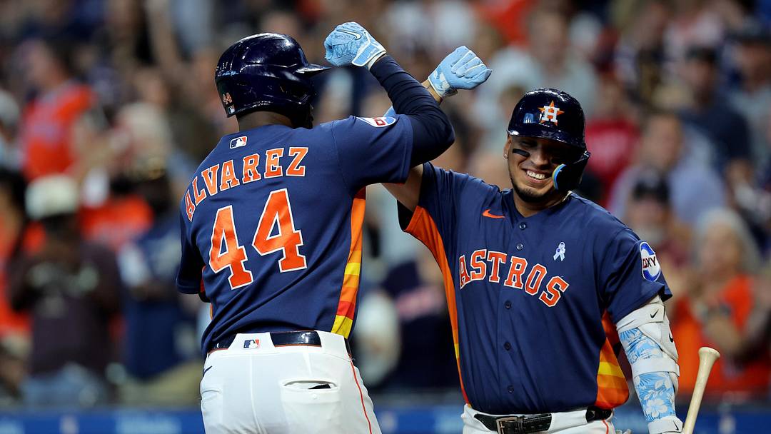 Houston Astros left fielder Yordan Alvarez (44) is congratulated by third baseman Isaac Paredes (15) after hitting a home run.
