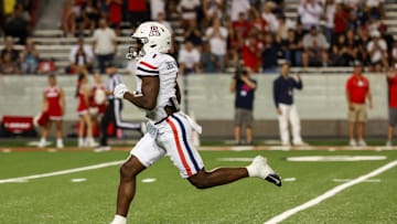 Aug 31, 2024; Tucson, Arizona, USA; Arizona Wildcats running back Jacory Croskey-Merritt (1) runs the ball for a touchdown during fourth quarter at Arizona Stadium. 