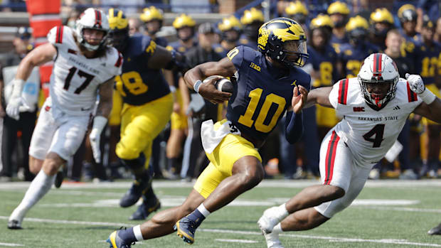 Sep 14, 2024; Ann Arbor, Michigan, USA;  Michigan Wolverines quarterback Alex Orji (10) in second half against Arkansas St.