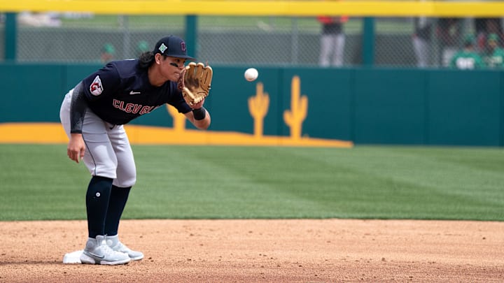 Mar 20, 2022: Cleveland Guardians infielder Yu Chang (2) on second base during the second inning against the Oakland Athletics during spring training at Hohokam Stadium. 