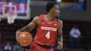 Nov 17, 2023; Charleston, SC, USA; Houston Cougars guard LJ Cryer (4) brings the ball down court in the first half against the Utah Utes at TD Arena.