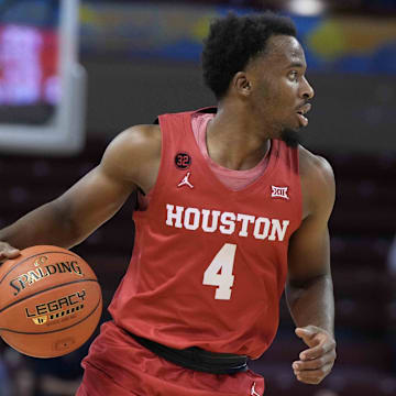 Nov 17, 2023; Charleston, SC, USA; Houston Cougars guard LJ Cryer (4) brings the ball down court in the first half against the Utah Utes at TD Arena.