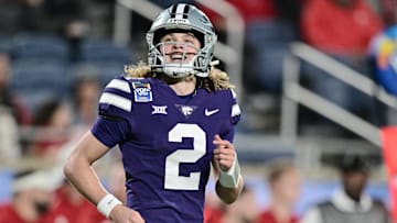 Kansas State quarterback Avery Johnson (2) smiles during the 2023 Pop-Tarts Bowl in Orlando, Fla., on Thursday, Dec. 28, 2023, at Camping World Stadium. Mandatory Credit: Julio Aguilar/Getty Images