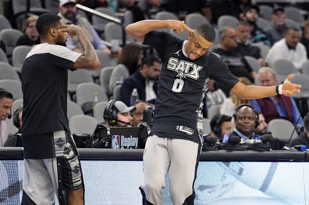 San Antonio Spurs forward Keldon Johnson (0) and guard Blake Wesley (14)