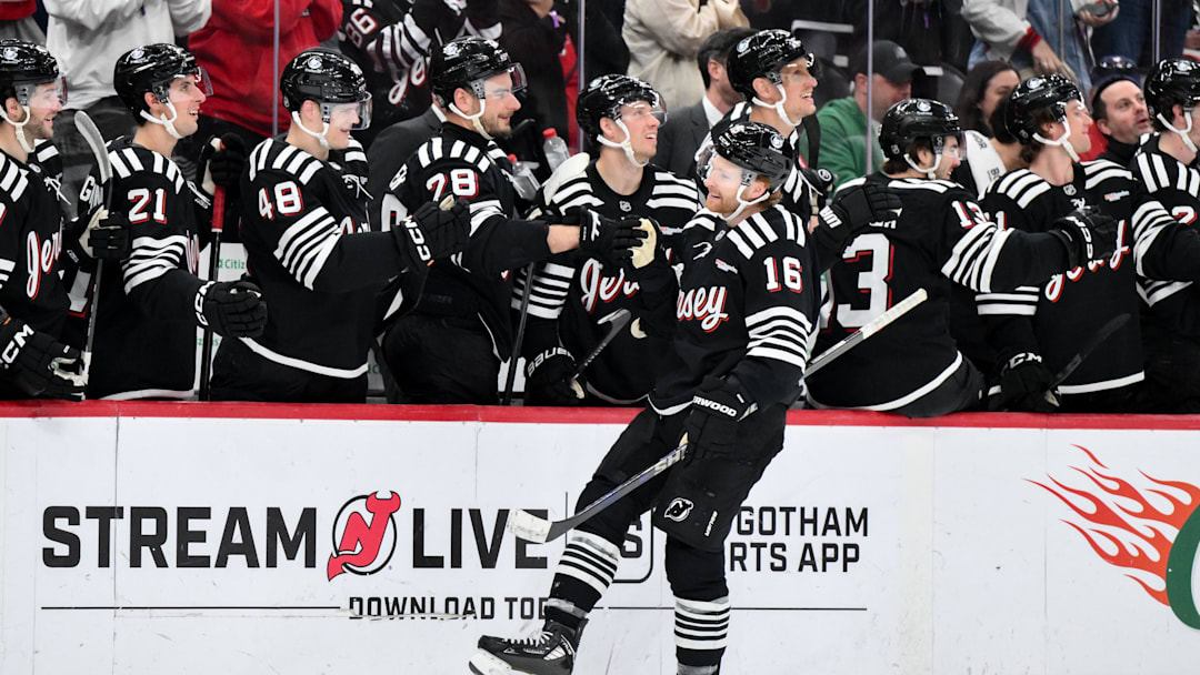 Apr 12, 2026; Newark, New Jersey, USA; New Jersey Devils right wing Connor Brown (16) celebrates with teammates after scoring a goal against the Ottawa Senators during the first period at Prudential Center. Mandatory Credit: John Jones-Imagn Images
