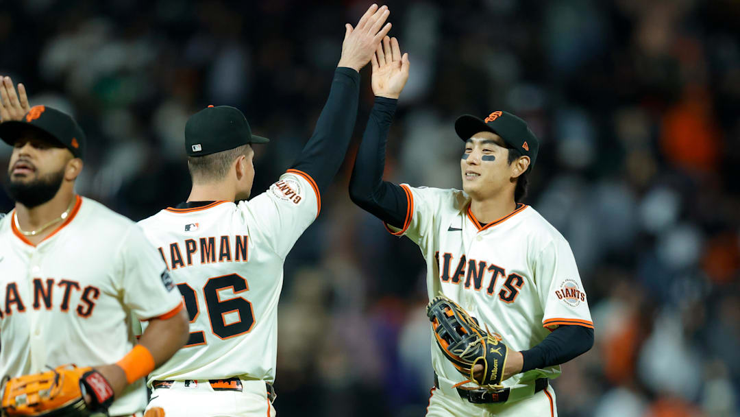 Apr 21, 2025; San Francisco, California, USA; San Francisco Giants center fielder Jung Hoo Lee (51) celebrates with teammates after the game against the Milwaukee Brewers at Oracle Park. 
