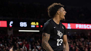 UCF Knights guard Brandon Mahan (13) celebrates after an offensive stop in double overtime of the NCAA mens basketball game on Wednesday, Feb. 19, 2020, at Fifth Third Arena in Clifton. UCF Knights defeated Cincinnati Bearcats 89-87 in double overtime.

Cincinnati Bearcats Ucf Knights 151