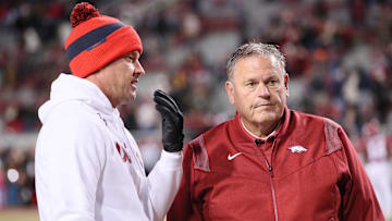 Ole Miss Rebels head coach Lane Kiffin talks to Arkansas Razorbacks head coach Sam Pittman prior to the game at Donald W. Reynolds Razorback Stadium. 