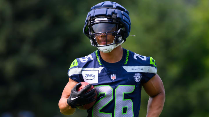 Jul 27, 2024; Renton, WA, USA; Seattle Seahawks running back Zach Charbonnet (26) during training camp at Virginia Mason Athletic Center.