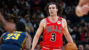 Mar 2, 2025; Indianapolis, Indiana, USA; Chicago Bulls guard Josh Giddey (3) dribbles the ball while Indiana Pacers forward Aaron Nesmith (23) defends