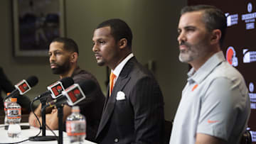Mar 25, 2022; Berea, OH, USA; Cleveland Browns quarterback Deshaun Watson, center, general manager Andrew Berry, left, and head coach Kevin Stefanski talk with the media during a press conference at the CrossCountry Mortgage Campus. Mandatory Credit: Ken Blaze-Imagn Images