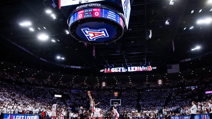 Jan 27, 2025; Tucson, Arizona, USA; Arizona Wildcats forward Tobe Awaka (30) and Iowa State center Dishon Jackson (1) jump for tip off at McKale Center. Mandatory Credit: Aryanna Frank-Imagn Images