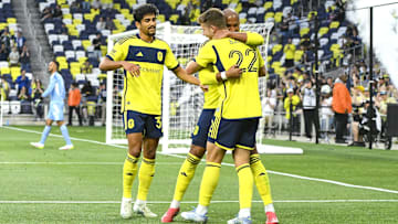 Nashville SC forward Teal Bunbury (12) celebrates the goal of defender Josh Bauer (22) against the Chattanooga Red Wolves  