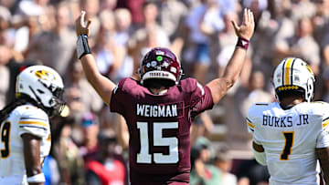 Oct 5, 2024; College Station, Texas, USA; Texas A&M Aggies quarterback Conner Weigman (15) reacts in the second quarter against the Missouri Tigers at Kyle Field. Mandatory Credit: Maria Lysaker-Imagn Images. 
