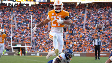 Tennessee running back Peyton Lewis (27) jumps into the end zone during a NCAA football game between Tennessee and UTEP in Neyland Stadium on Saturday, November 23, 2024.