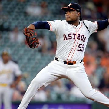 Sep 12, 2024; Houston, Texas, USA; Houston Astros starting pitcher Framber Valdez (59) delivers a pitch against the Oakland Athletics during the first inning at Minute Maid Park. 