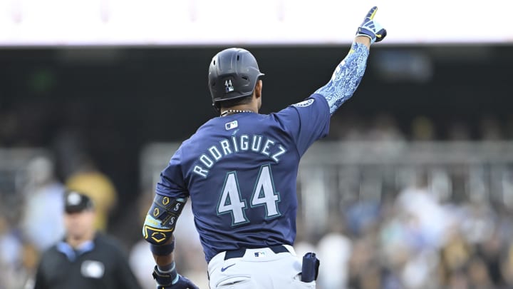 Seattle Mariners center fielder Julio Rodriguez rounds the bases after hitting a solo home run against the San Diego Padres on July 9.