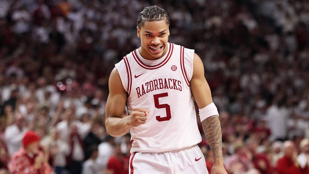 Jan 3, 2026; Fayetteville, Arkansas, USA; Arkansas Razorbacks guard Darius Acuff Jr (5) celebrates after a foul call against the Tennessee Volunteers during the second half at Bud Walton Arena.  Mandatory Credit: Nelson Chenault-Imagn Images