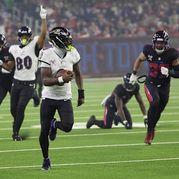Jackson races to the end zone as the Ravens blow out the Texans on Christmas.