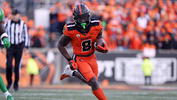 Nov 26, 2022; Corvallis, Oregon, USA; Oregon State Beavers running back Jam Griffin (8) runs the ball during the second half against the Oregon Ducks at Reser Stadium. Mandatory Credit: Soobum Im-USA TODAY Sports