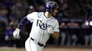 Sep 16, 2025; St. Petersburg, Florida, USA; Tampa Bay Rays second baseman Brandon Lowe (8) hits a RBI single ninth inning against the Toronto Blue Jays at George M. Steinbrenner Field. 