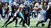 Nov 9, 2025; Charlotte, North Carolina, USA; Carolina Panthers quarterback Bryce Young (9) hands the ball off during the first quarter against the New Orleans Saints at Bank of America Stadium. Mandatory Credit: Jim Dedmon-Imagn Images