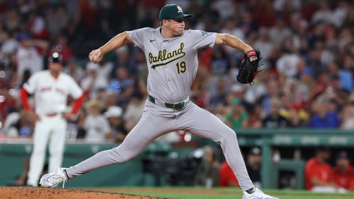 Jul 10, 2024; Boston, Massachusetts, USA; Oakland Athletics relief pitcher Mason Miller (19) delivers a pitch during the ninth inning against the Boston Red Sox at Fenway Park. Mandatory Credit: Paul Rutherford-USA TODAY Sports