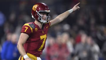 Dec 27, 2023; San Diego, CA, USA; USC Trojans quarterback Miller Moss (7) gestures during a running play against the Louisville Cardinals in the second half at Petco Park. Mandatory Credit: Orlando Ramirez-USA TODAY Sports