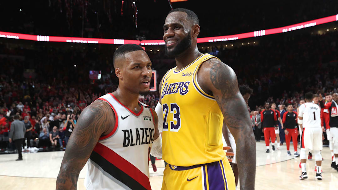 Oct 18, 2018; Portland, OR, USA; Portland Trail Blazers guard Damian Lillard (0) and Los Angeles Lakers forward LeBron James (23) hug after their game at Moda Center. Mandatory Credit: Jaime Valdez-Imagn Images Oct 18, 2018; Portland, OR, USA; Portland Trail Blazers guard Damian Lillard (0) and Los Angeles Lakers forward LeBron James (23) hug after their game at Moda Center. Mandatory Credit: Jaime Valdez-Imagn Images