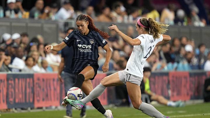 Washington Spirit forward Trinity Rodman (2) and Bay FC defender Kayla Sharples (27)  